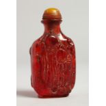 A CARVED AMBER TYPE SNUFF BOTTLE