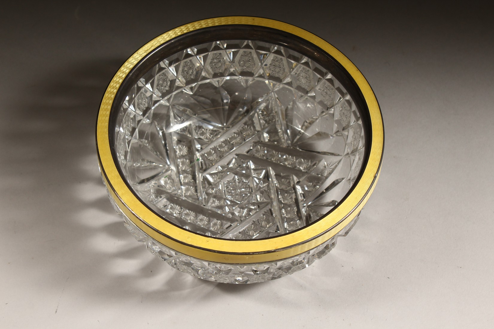 A CUT GLASS CIRCULAR BOWL with silver and yellow enamel rim 6ins diameter. - Image 5 of 8