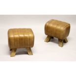 A PAIR OF LEATHER POMMEL HORSE STYLE STOOLS 1ft long.