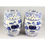 A PAIR OF CHINESE BLUE AND WHITE BARREL SEATS 18ins high.