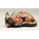 A JAPANESE SATUMA SLEEPING CAT 9.5ins long