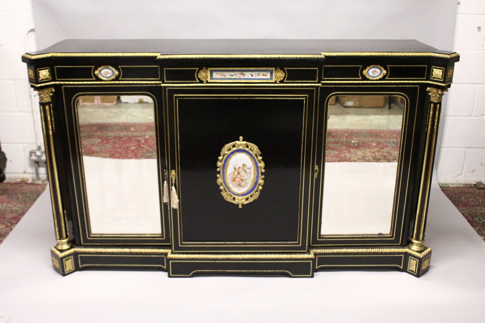 A VERY GOOD 19TH CENTURY FRENCH EBONY BREAK FRONT CREDENZA, with ornate mounts inset with Sevres - Image 2 of 6