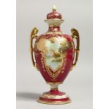 A NORITAKE TWO HANDLED URN SHAPED VASE AND COVER painted with reverse scenes of a lakeland