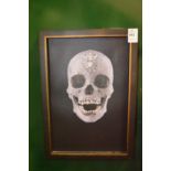 In the manner of Damien Hirst, a photographic print on canvas of a diamond skull.