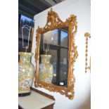 A very good pair of carved giltwood framed pier mirrors.
