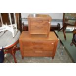 Two modern hardwood chests.