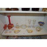 A good collection of cut glass and gilded objects to include baskets, bowls, liqueur set etc.