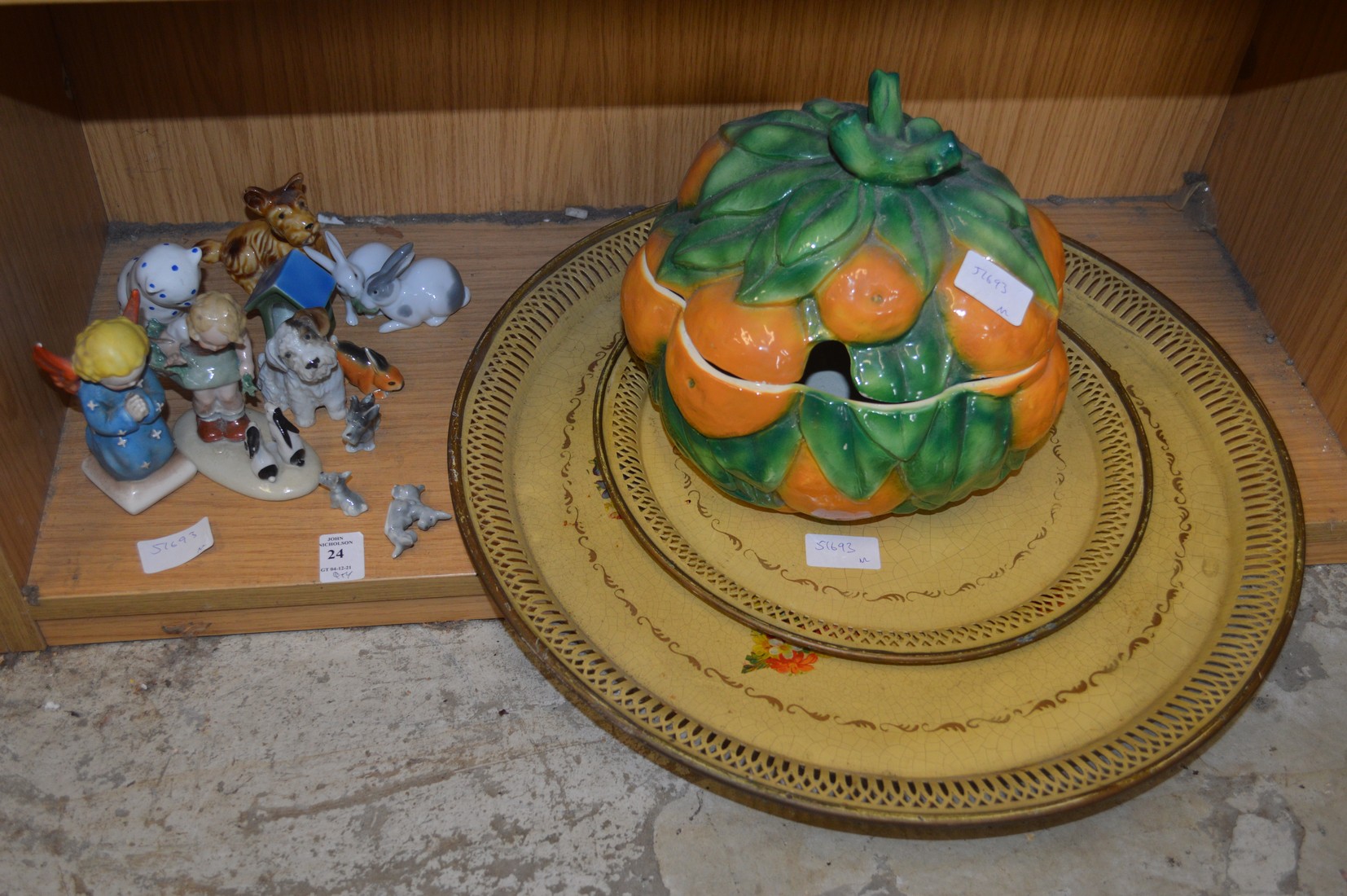 Decorative china ornaments, a fruit shaped tureen and two Toleware trays.