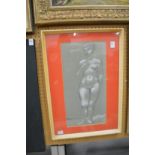 A standing female nude, pencil and chalk drawing, signed.
