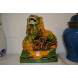 A good Chinese Sancai glazed pottery figure of a lion dog.