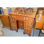 A good Sheraton revival inlaid mahogany kneehole pedestal desk.