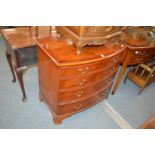 A yew wood bow fronted flour drawer chest.