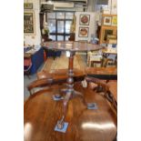 A good George III design mahogany pie crust tilt top tripod table on well carved base with paw