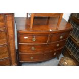A 19th century mahogany bow front chest of two short and two long drawers on splay bracket feet.