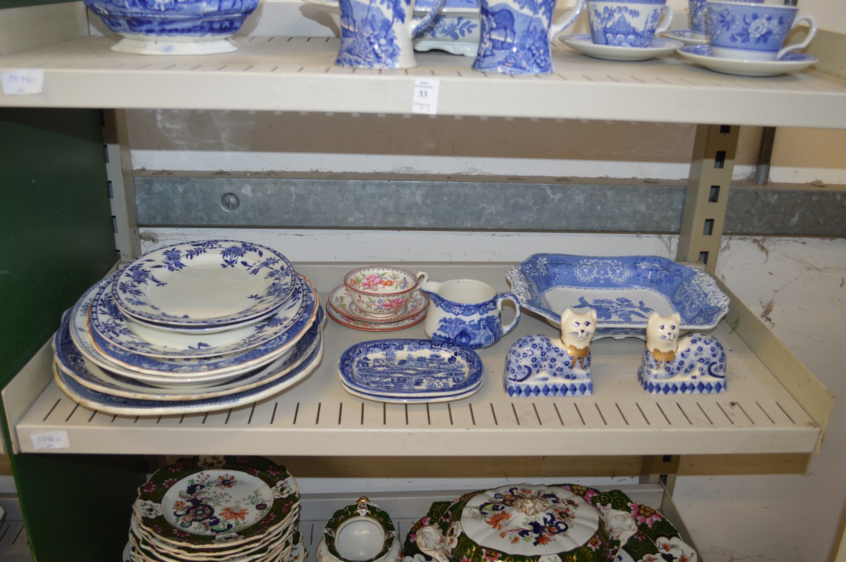 Two shelves of blue and white china together with a floral decorated trio. - Image 2 of 2