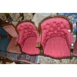 A good pair of carved mahogany and parcel gilt framed button upholstered armchairs.