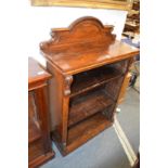 A Victorian rosewood open bookcase.