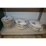 A quantity of Limoges floral decorated dinner ware.