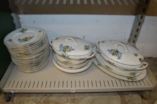 A quantity of Limoges floral decorated dinner ware.