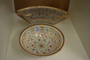 A floral and gilt decorated bowl together with a pair of crescent shaped dishes to match.