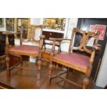 A set of six oak 1930's dining chairs, two with arms.