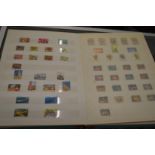 A large album containing numerous Australian stamps.