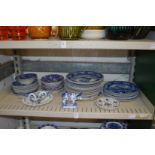 A large quantity of blue and white china to include Wedgwood Fallow Deer plates.