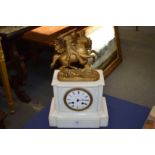 A Victorian white marble mantle clock with spelter mount, modelled as a knight on horseback.