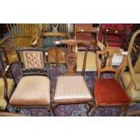 Three various dining chairs.