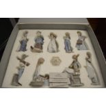 Lladro Collector's Society, a cased set of nine figures.