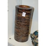 An unusual tree bark vase.