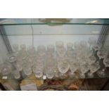 A good collection / part suite of cut glass drinking glasses.