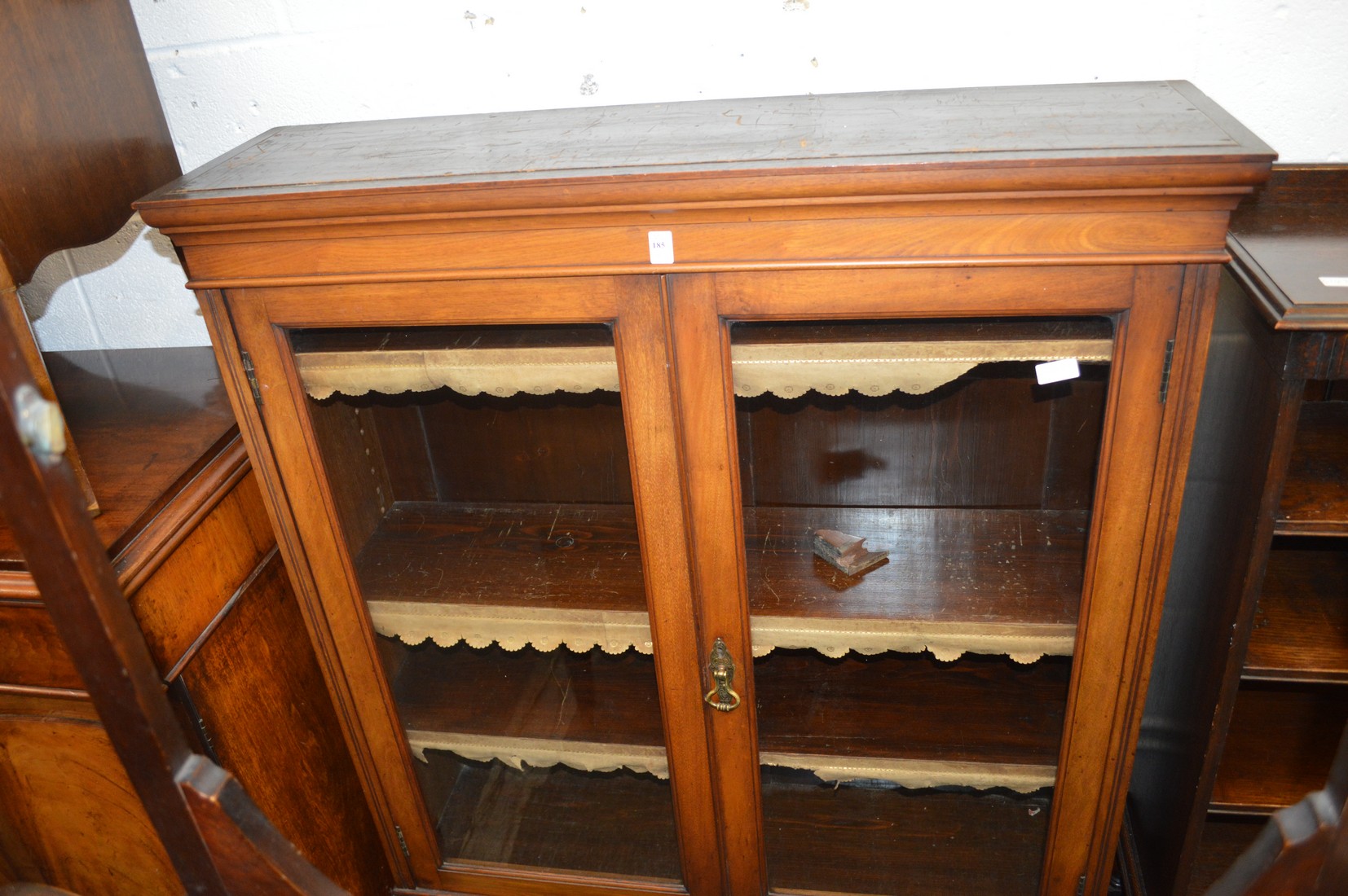 A mahogany two door bookcase.