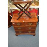 A Georgian style yew wood chest of two short and two long drawers.