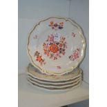 Five floral decorated plates.