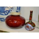 A small Chinese flambe vase and a little bottle vase.