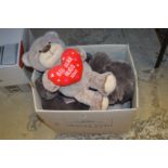 A box of soft toys.