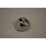 An unusual stainless steel gent's signet ring, size O1/2 (made by Mick Griffiths).