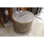 An unusual circular lead box and cover.
