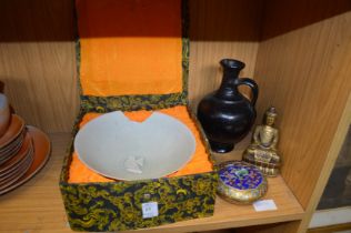 A Chinese bowl, boxed, a cloisonne box and cover, a Buddha and a stone jug.