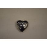 An unusual stainless steel heart shaped pendant (made by Mick Griffiths).
