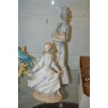 Two Lladro figurines.