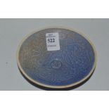A small Chinese circular bowl incised with fish.
