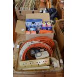 A box of extension cables and a box of light bulbs.