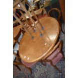 A good Victorian inlaid figured walnut oval Loo / breakfast table.