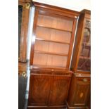 A Victorian mahogany cupboard bookcase.