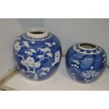 Two Chinese blue and white prunus jars, lacking covers.