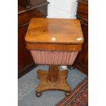 A 19th century rosewood sewing table.