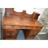 A early 20th century rosewood pedestal sideboard.