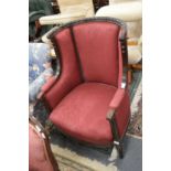 A good 19th century carved mahogany wing armchair.